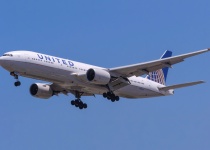 S United Airlines z londýnského Heathrow do Newarku, USA 